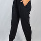 White Birch Full Size Drawstring Waist Rib-Knit Joggers with Pockets in Black
