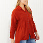 Zenana Bright and Airy Raw Edge Peplum Shirt with Pockets in Copper